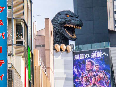 JAPAN, TOKYO - APRIL 20, 2019: Life size Godzilla looks out over the city from the eighth floor in Shinjukuのeditorial素材