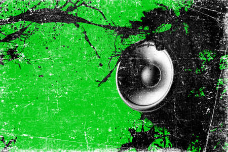 background in black and green paint with sound speakerの写真素材