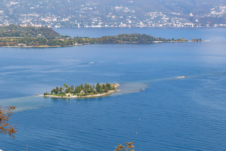 Islet off the coast of Manerba del Garda seen from the Rocca di Manerbaの写真素材