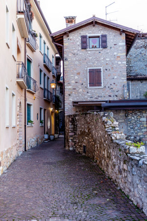 Ancient buildings of Torri del Benaco on the medium Veronese coast of Lake Garda, on the border with Garda to the south and Brenzone to the north. The center is made up of characteristic views.のeditorial素材