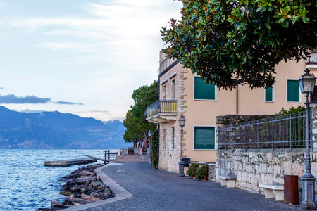 Lakefront of Torri del Benaco on the medium Veronese coast of Lake Garda, on the border with Garda to the south and Brenzone to the north. The center is made up of characteristic views.のeditorial素材