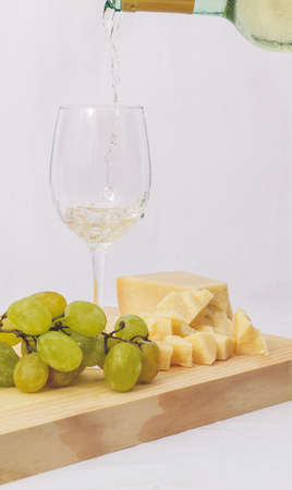 A glass of Italian white wineの写真素材