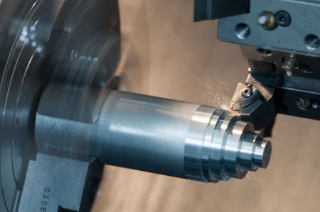 CNC Lathe machine working iron surfaceの写真素材