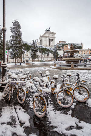 a beautiful view of Altare della Patria and Fontana dell'Aracoeli under the snowの写真素材