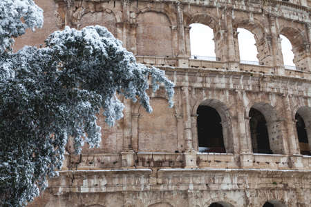 A lovely day of snow in Rome, Italy, 26th February 2018: a beautiful view of Colosseum under the snowの写真素材
