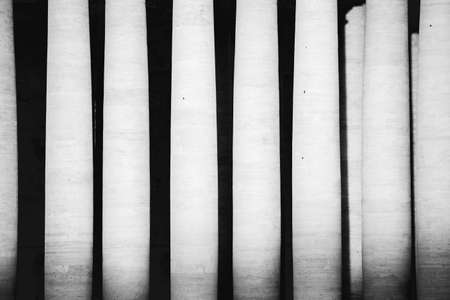 A fine art shot of Columns in Saint Peter Square, near the Basilica of Saint Peter in Rome, Italyの写真素材