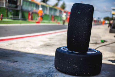 Old tyres of supercars in the garage