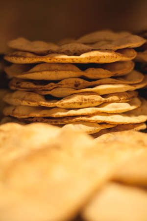 Italian pizza near a furnace in a restaurantの写真素材