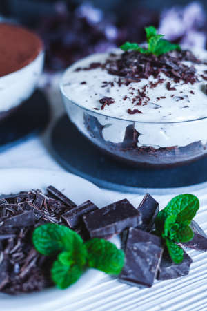 Delicious homemade chocolate cheesecake with cocoa and mintの写真素材