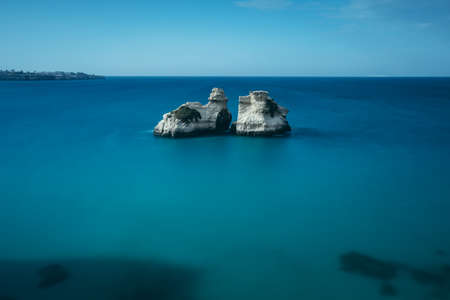 The "Two Sisters" rock in Torre dell'Orso, Malendugno, Puglia, Italyの写真素材