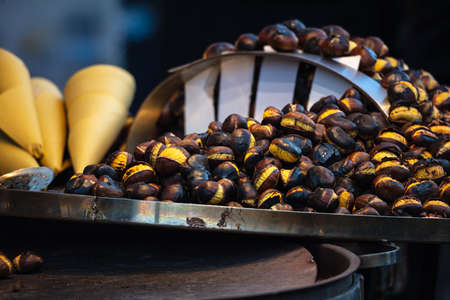 A closeup view of some roasted chestnuts in Navona Square, Christmas, Rome, Italyの写真素材