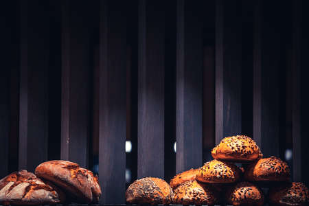 Composition of ordinary bakery with bread and buns in a bakeryの写真素材