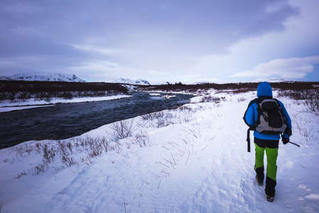 A man is taking walk the pathway to BrÃºarÃ¡rfoss, Iceland, North Atlantic Oceanの写真素材