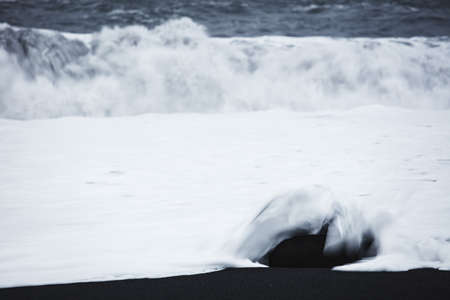 Waves on the Black Sand Beach, Vik, Iceland, North Atlantic Oceanの写真素材