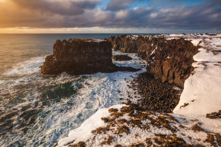SvÃ¶rtuloft lighthouse, Iceland, North Atlantic Oceanの写真素材