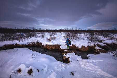 A man is taking walk the pathway to BrÃºarÃ¡rfoss, Iceland, North Atlantic Oceanの写真素材