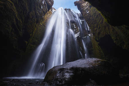 Explorer man in the cave, Icelandの写真素材