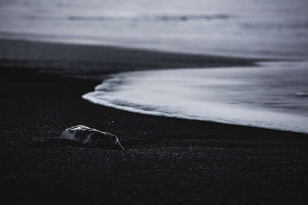 Waves on the Black Sand Beach, Vik, Iceland, North Atlantic Oceanの写真素材