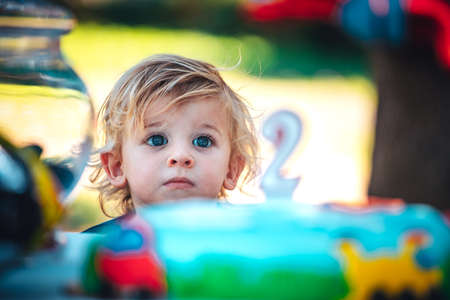 Little happy child celebrates his two yearsの写真素材