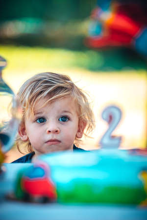 Little happy child celebrates his two yearsの写真素材