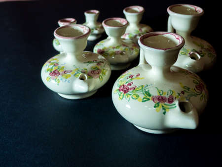 a composition of italian ceramic handmade pitchers on a dark backgroundの写真素材