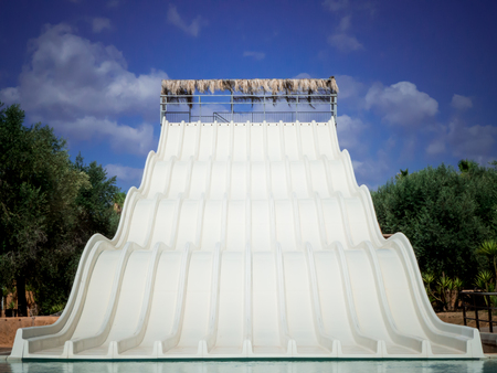 a white water slide in an acquapark in the south of italy in a hot summer dayの写真素材