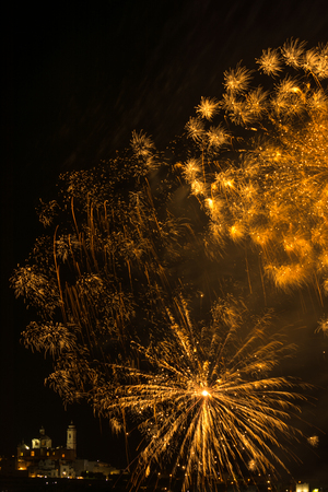 fireworks in the sky over the city of Locorotondo, in the south of italy, during the celebrations of saint roccoの写真素材