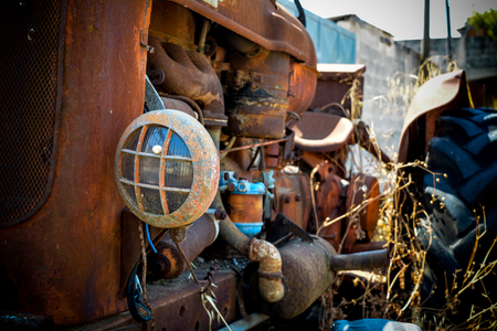 Particulars of an old tractor, abandoned in a south Italian countrysideの写真素材