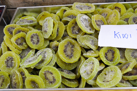 dried kiwi in a stall at the market on blur backgroundの写真素材