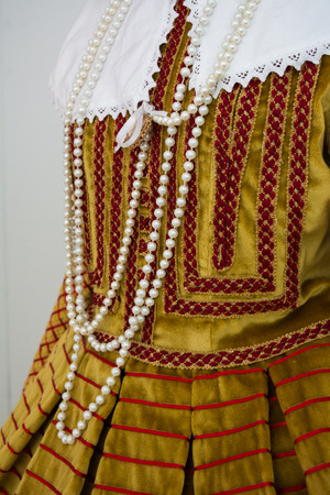 detail of ancient and historic colored italian dressesの写真素材
