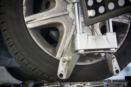detail of wheel alignment machine tool at the tire shopの写真素材