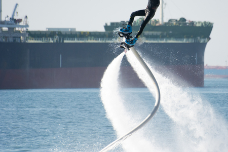 flyboard show in the ionian sea on blur background