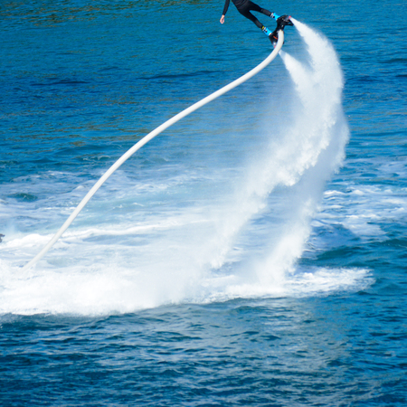 flyboard show in the ionian sea on blur backgroundの写真素材