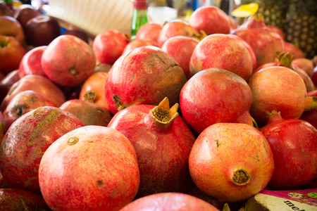 sale of pomegranates at the marketplaceの写真素材