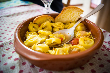 Italian Traditional Food Called Tortellini In Brodo With Bread. A Good Food For Christmas And Winter Period.の写真素材