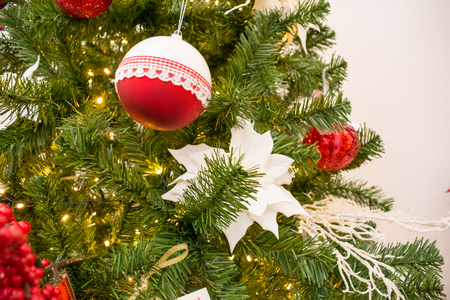 Christmas Tree With Red And White Balls Decoration On Light Backgroundの写真素材