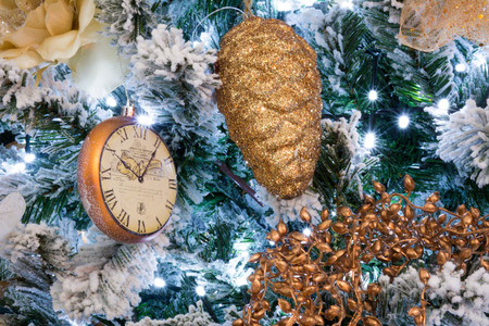 Close Up Of  Snowy Christmas Tree With Decoration On Snowy Background