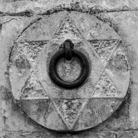 Close Up of a Medieval Steel Ring for Parking Mules Near the Wall on the Street. Matera, South of...
