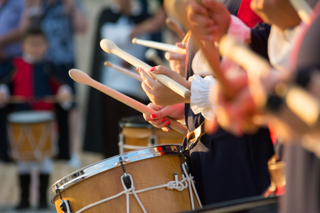 Group of Men Dressed in Medieval Clothes Playing Drums in Italyの写真素材