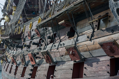 Close Up of the Starboard Side of an Ancient Pirate Galeon with the Hatches of the Cannons Open on...