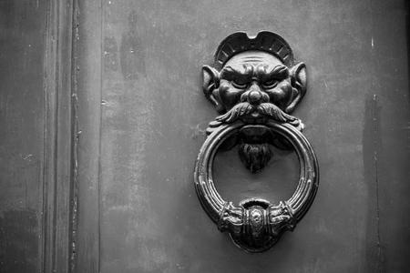 Old Clapper on Wooden Old Door. Copy Spaceの写真素材