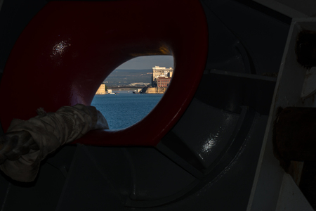 Horizontal View of the Taranto Swing Bridge Taken from a Hole of a Ship before the Transit. Taranto, Italyの写真素材