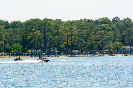 People Enjoying with Jet Boating at Sea in Florida on Blur Backgroundの写真素材