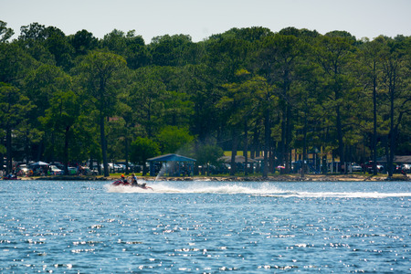 People Enjoying with Jet Boating at Sea in Florida on Blur Backgroundの写真素材