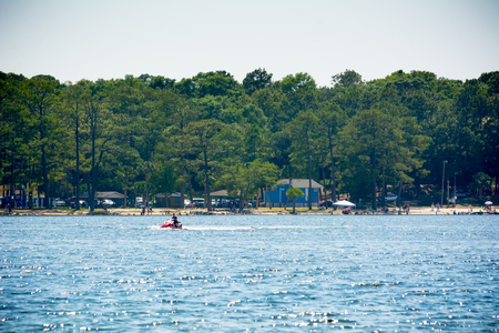 People Enjoying with Jet Boating at Sea in Florida on Blur Backgroundの写真素材