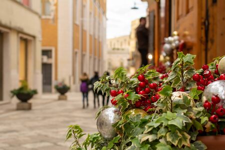 Christmas Decorations in a street during Christmas Period in Matera, Italy, on blurred backgroundの写真素材