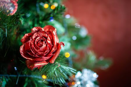 Christmas Decorations on Christmas Tree on Blurred Background in Italyの写真素材