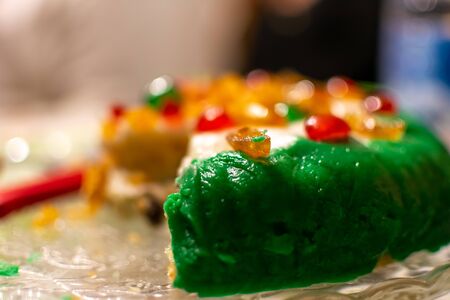 Close Up of a Pie covered by Almond Paste and full of ricotta cheese during birthday party on Blurred Backgroundの写真素材