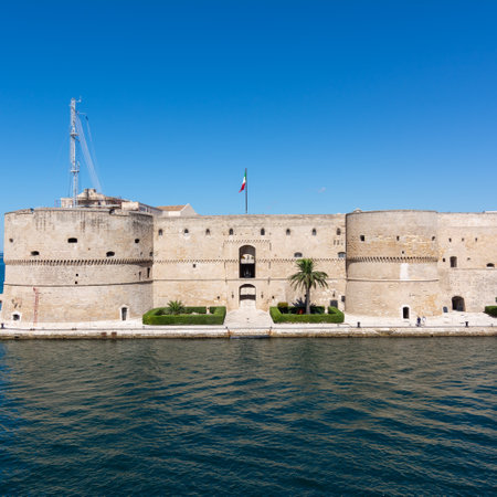 frontal view of the aragonian castle in taranto on blue sky background in summerのeditorial素材