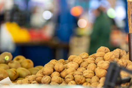 Close Up of a Group of Nuts at the Italian Market on Blurred Background